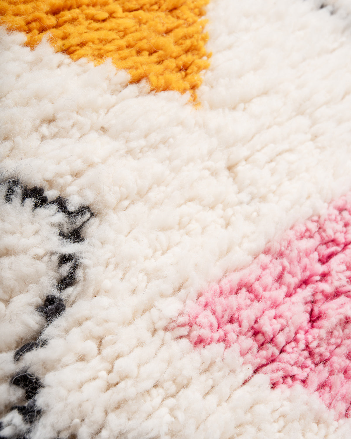 Modern, designer, handcrafted Berber rug from Morocco. Beniourain carpet with beautiful colours and patterns and fluffy wool texture.
